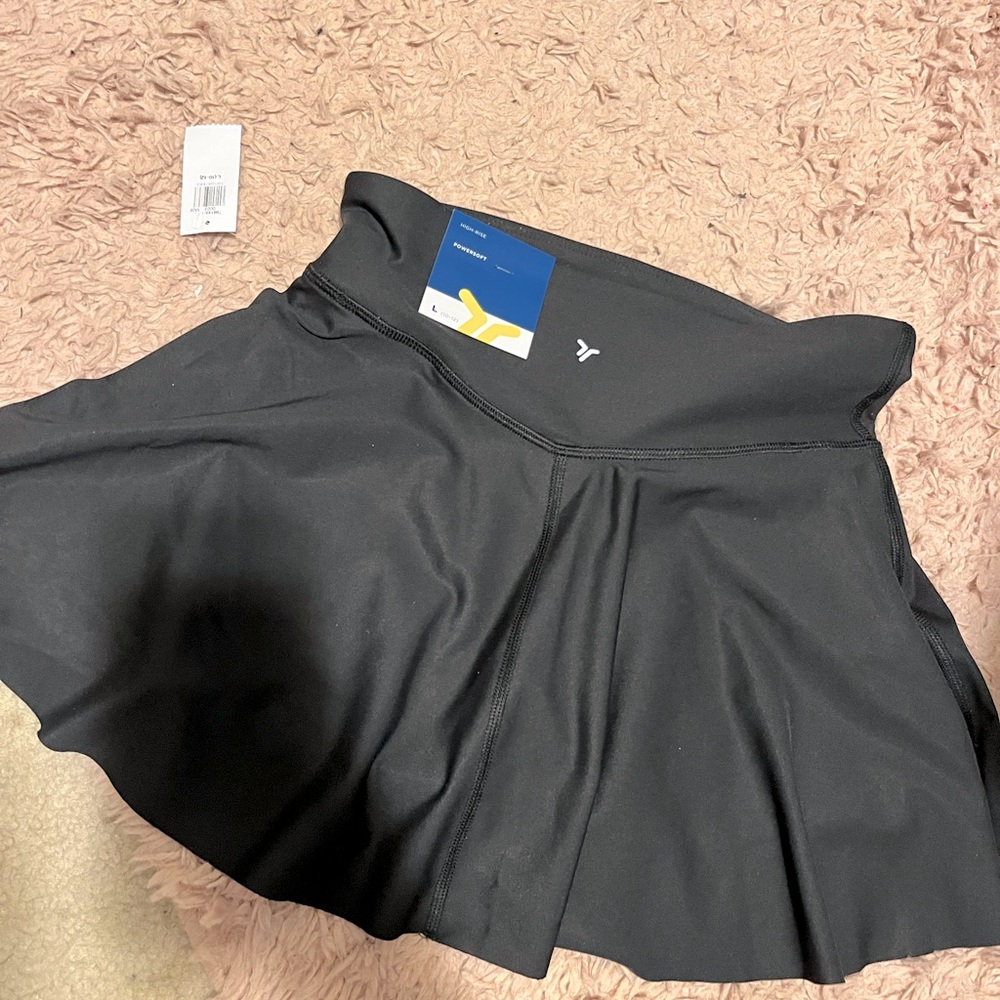 Brand new black te is skirt